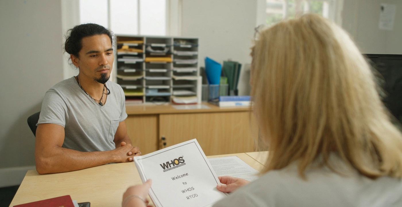 A WHOS staff member welcoming a person to an OTP Residential Program.